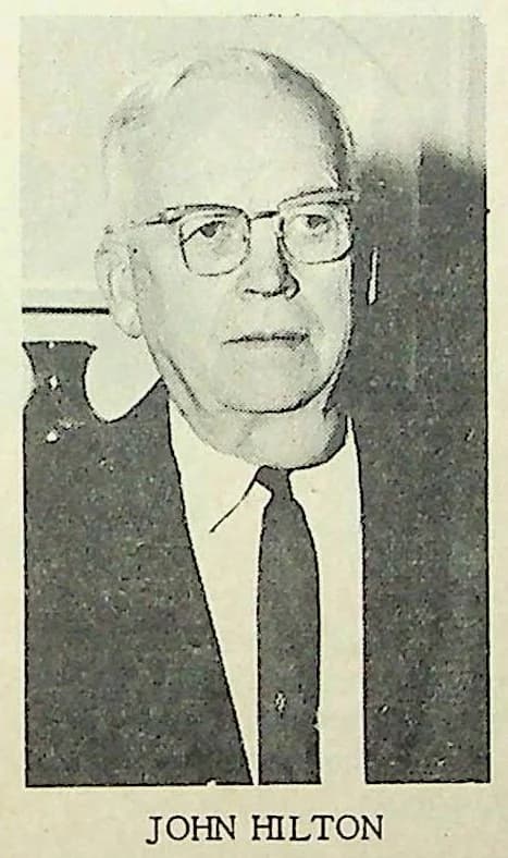 Archival portrait of Marysville Mayor John Hilton wearing glasses, a suit, and tie