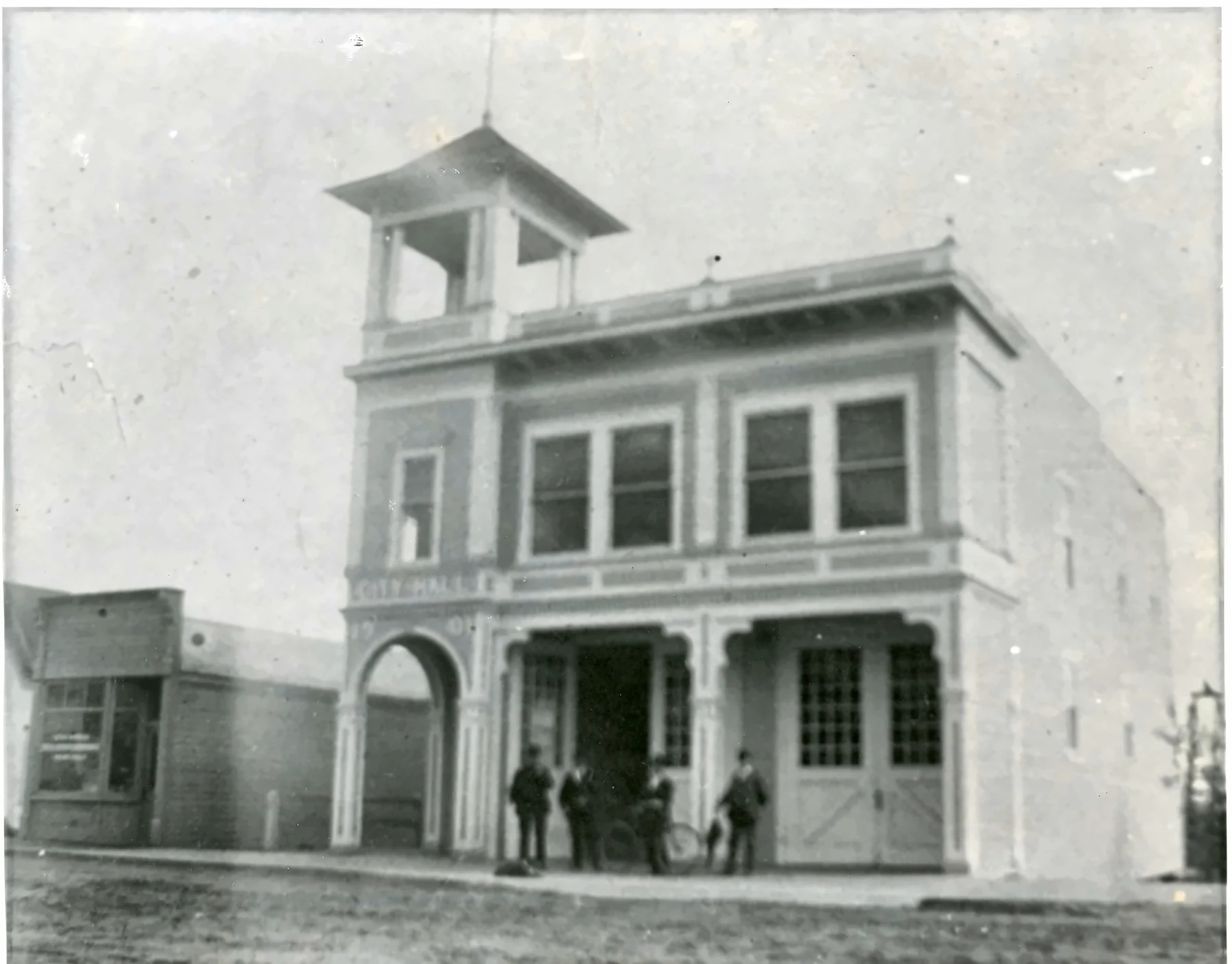 Marysville's historic City Hall with people gathered at the entrance