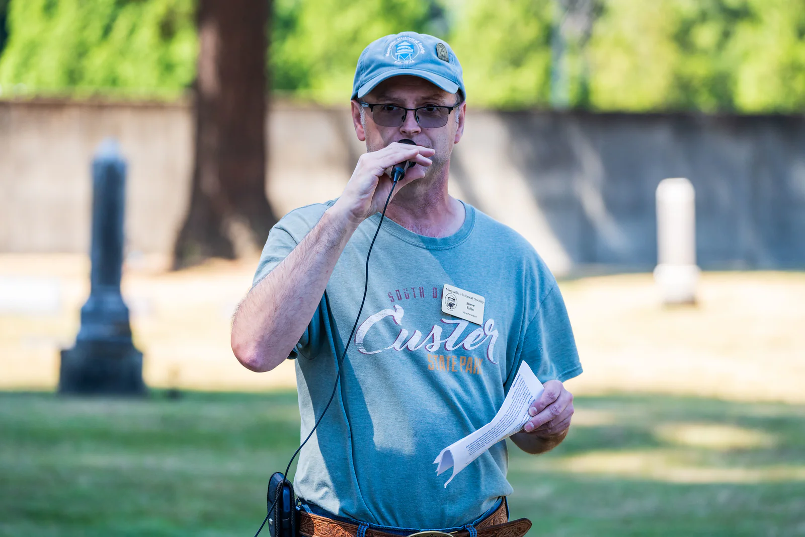 Steve Edin addresses guests during the 2025 Annual Cemetery Tour